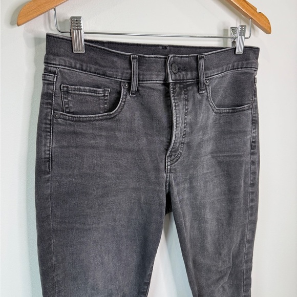 Express Skinny Mid Rise Black Raw Hem Jeans (6) - Picture 3 of 10